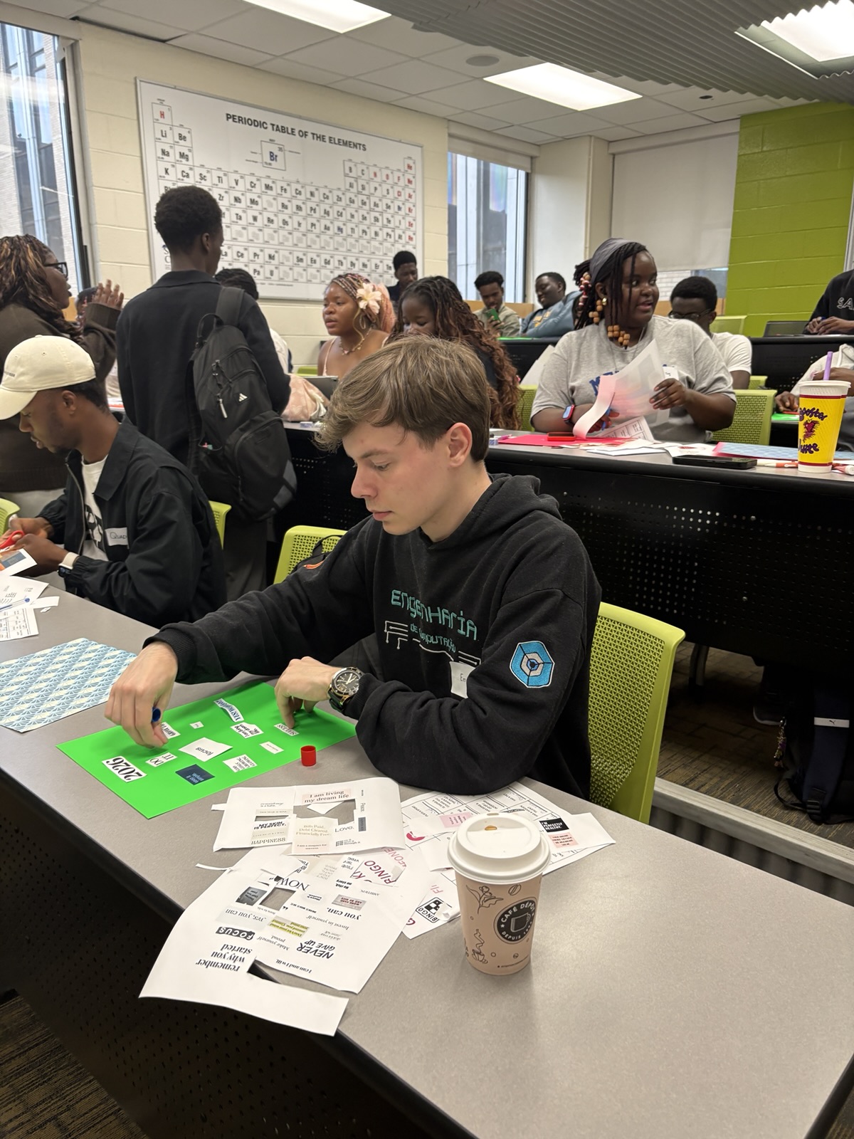 A member working on a hands-on activity at a table